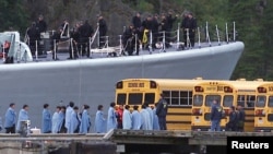 FILE - The HMCS Algonquin departs Gold River after dropping off its cargo of illegal Asian migrants, Aug. 31, 1999. The refugees will be processed by immigration officials and detained at a military base in Victoria.