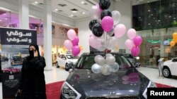 A Saudi woman is seen at the first automotive showroom solely dedicated for women in Jeddah, Saudi Arabia Jan. 11, 2018.