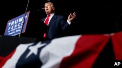 FILE - Donald Trump speaks during a rally in Toledo, Ohio, while campaigning for the 2016 Republican presidential nomination, Oct. 27, 2016. 