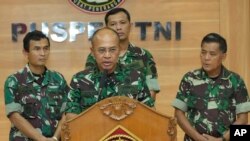 Indonesian military spokesman Rear Admiral Julius Widjojono speaks during a press conference at Indonesia military headquarter in Jakarta, Indonesia, April 16, 2023. 