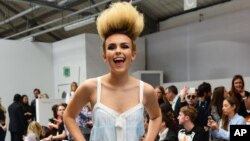 Model Tallia Storm at London Fashion Week shows off bleached, treated and teased up hair. (Photo by: KGC-42/STAR MAX/IPx, September 18, 2015)