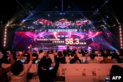 A screen shows sales information during the 2020 Tmall Global Shopping Festival in Hangzhou, in eastern China's Zhejiang province on Nov. 11, 2020.