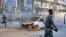 A Somali soldier attends the scene after a bomb attack near the office of the International Committee of the Red Cross in Mogadishu, Somalia, March 28, 2018. 