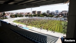 A general view shows an art installation of women dresses, named "Thinking of You" by Kosovo-born, London-based artist Alketa Mrripa-Xhafa, in Pristina, June 12, 2015.