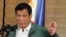 FILE - Philippine President Rodrigo Duterte speaks during a news conference in Davao.