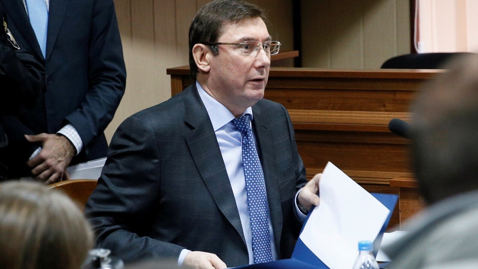 FILE - Ukraine's Prosecutor General Yuriy Lutsenko attends a trial in Kyiv, Nov. 28, 2016. 