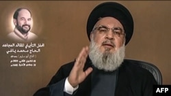 Picha iliyorushwa na televisheni ya Hezbollah ya al-Manar TV January 5, 2024, ikionyesha kiongozi wa kundi hiloHassan Nasrallah akitoa hotuba kwa njia ya televisheni.