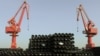 China Sets Ambitious Growth Target, Promises Steel Cuts