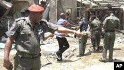 Wani jami'in tsaro kenan a wani wurin da 'yan Boko Haram su ka kai hari