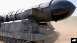 This image made from video of a news bulletin aired by North Korea's KRT on May 22, 2017, shows what was said to be the Pukguksong-2 missile at an undisclosed location in North Korea.