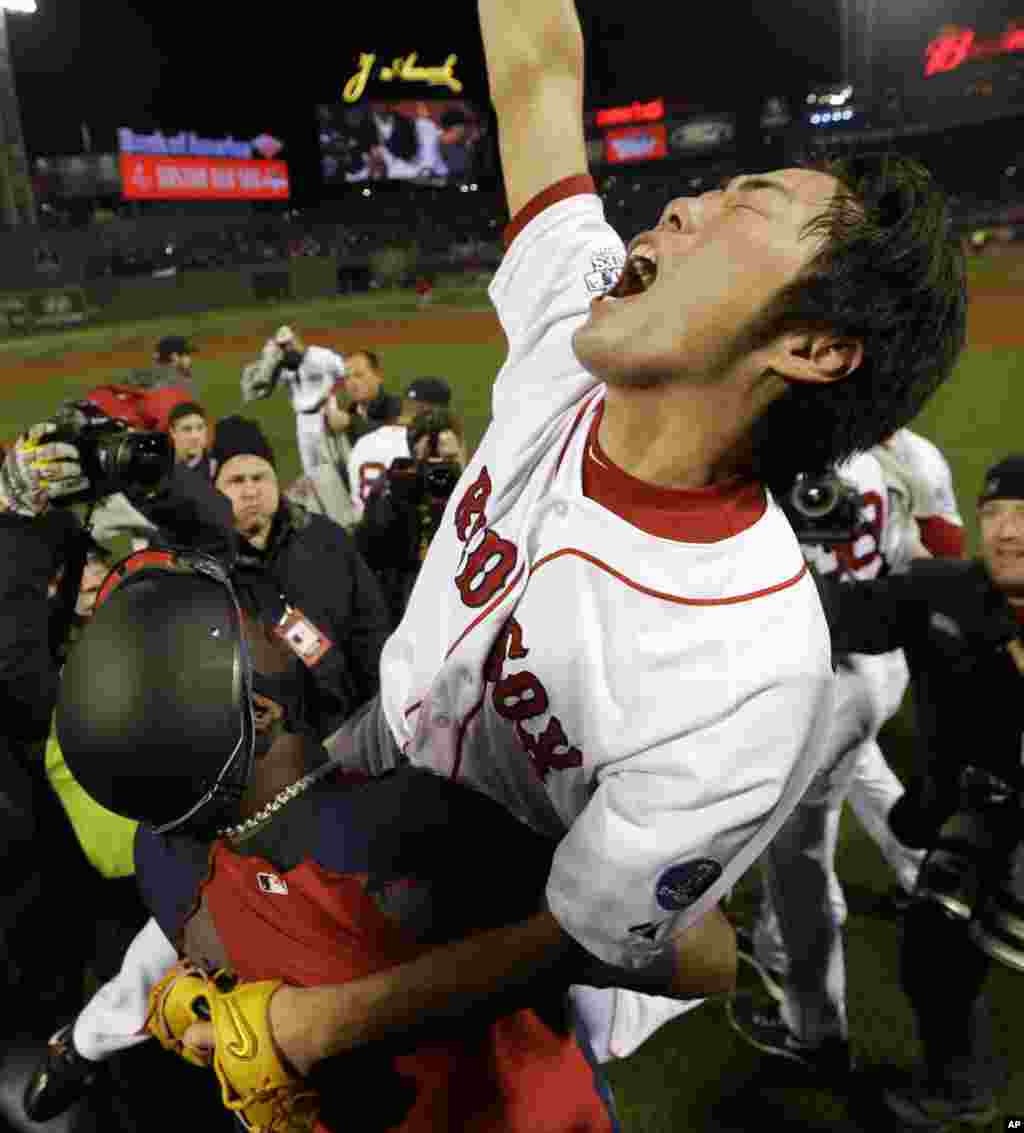 Oct 30, 2013; Boston, MA, USA; Boston Red Sox center fielder Jacoby Ellsbury (right) celebrates with teammates after winning game six of the MLB baseball World Series at Fenway Park. Red Sox won 6-1. Mandatory Credit: Greg M. Cooper-USA TODAY Sports - RTX