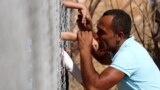 Cubans wade through a flooded street near the Malecon in Havana. Deadly Hurricane Irma battered central Cuba, knocking down power lines, uprooting trees and ripping the roofs off homes as it headed towards Florida.