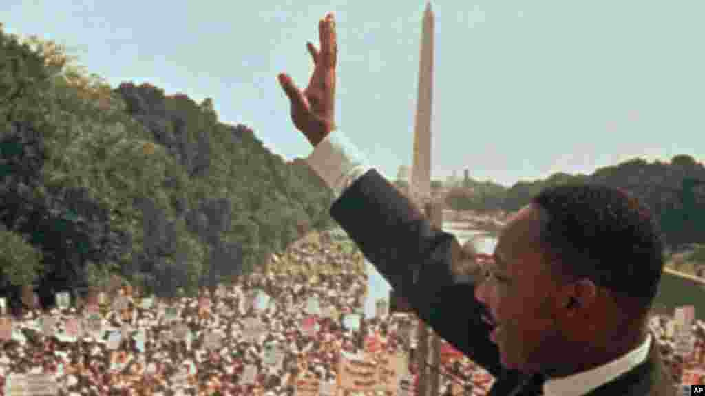 Dr. Martin Luther King Jr. acknowledges the crowd at the Lincoln Memorial for his "I Have a Dream" speech during the March on Washington, D.C. in this Aug. 28, 1963 file photo. 