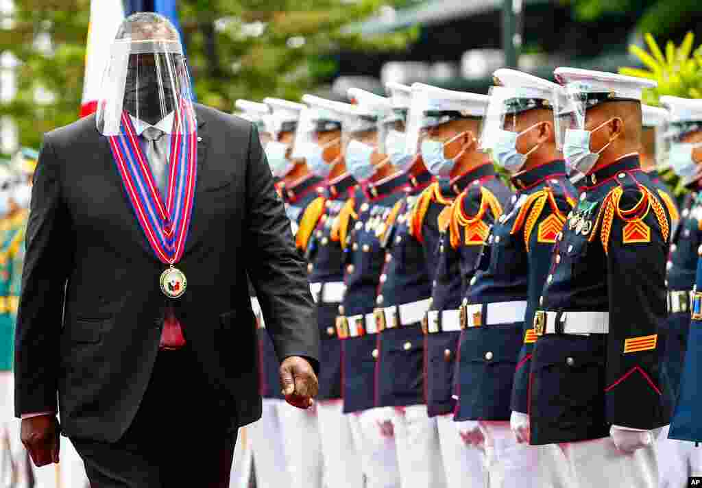 United States Defense Secretary Lloyd Austin views the military honor guard at Camp Aguinaldo military camp in Quezon City, Metro Manila, Philippines.