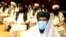 FILE - A member of Taliban negotiation delegation keeps his face mask on during the opening session of the peace talks between the Afghan government and the Taliban in Doha, Qatar, Sept. 12, 2020. The talks have achieved no breakthroughs. 