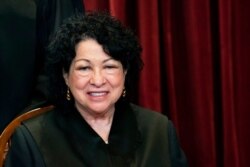 FILE - Associate Justice Sonia Sotomayor sits during a group photo at the Supreme Court in Washington, April 23, 2021.