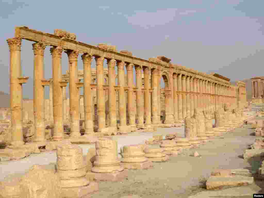 The demolition of ancient monuments like this colonnade in the historical city of Palmyra, Syria was targeted by the Islamic State group and among cultural sites destroyed in 2015. 