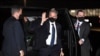 U.S. Secretary of State Antony Blinken waves as he walks to board his plane to travel to the G7 summit of foreign and development ministers in Liverpool, Britain, at Joint Base Andrews, Maryland, Dec. 9, 2021.