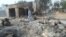 A man walks past burnt out houses following an attack by Boko Haram in Dalori village 5 kilometers (3 miles) from Maiduguri, Nigeria, Jan. 31, 2016.