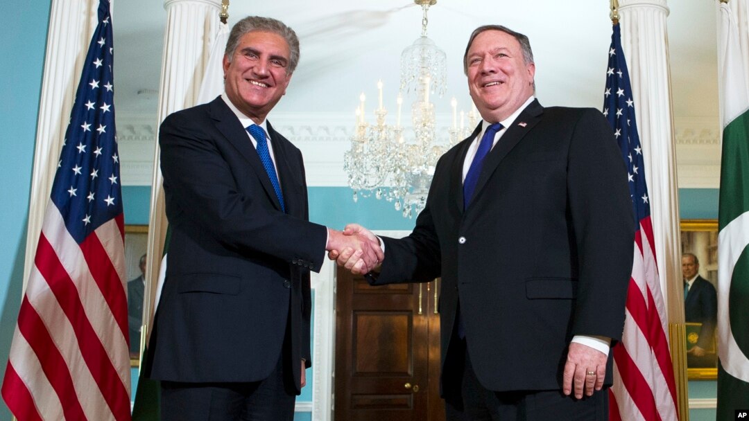 Secretary of State Mike Pompeo, right, meets Pakistani Foreign Minister Shah Mehmood Qureshi at the State Department in Washington, Oct. 2, 2018. 