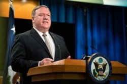 FILE - Secretary of State Mike Pompeo speaks during a news conference at the State Department, July 1, 2020.