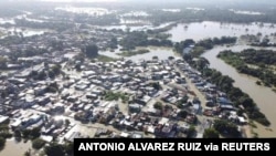 Aerial view shows a neighborhood flooded in the aftermath of Tropical Storm Eta and cold fronts, in Macuspana, Tabasco, Mexico, Nov. 9, 2020 in this drone picture obtained from social media.