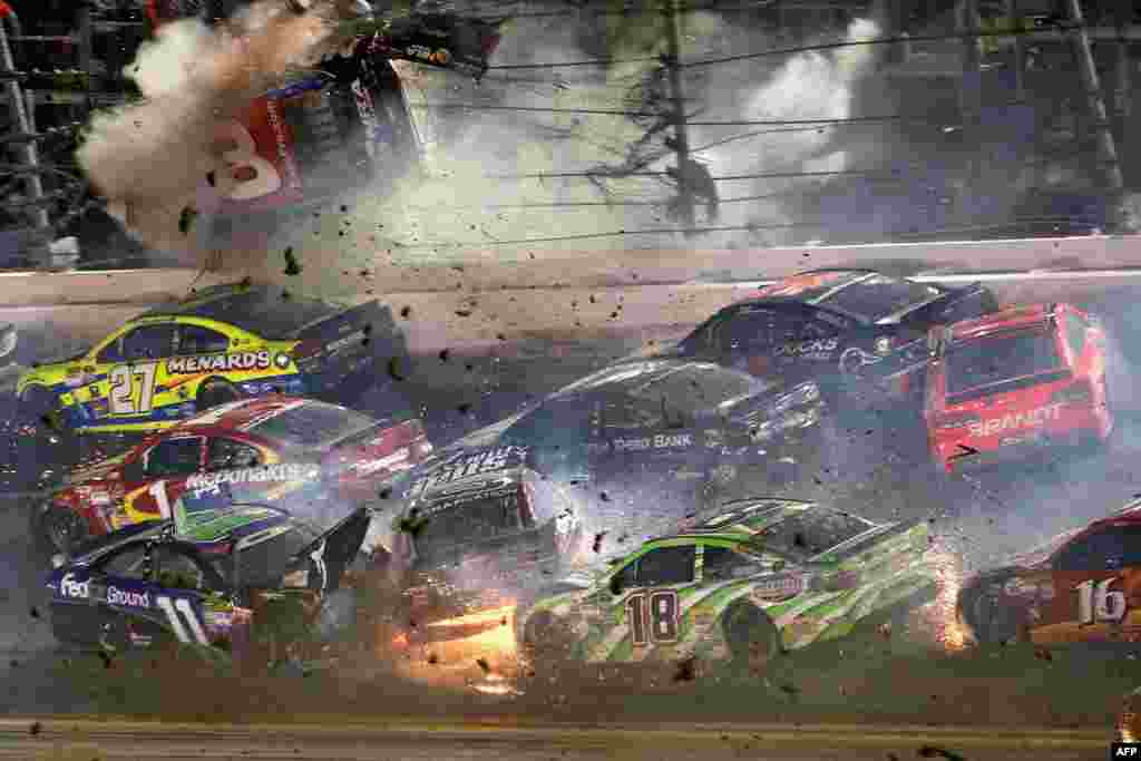 Austin Dillon, driver of the #3 Bass Pro Shops Chevrolet, is involved in an on-track incident following the checkered flag during the NASCAR Sprint Cup Series Coke Zero 400 Powered by Coca-Cola at Daytona International Speedway in Daytona Beach, Florida, USA, July 6, 2015.