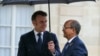 FILE - France's President Emmanuel Macron, left, welcomes Haiti's Presidential Council President Leslie Voltaire before a meeting at The Elysee Palace in Paris on Jan. 29, 2025. 