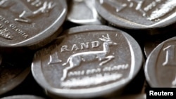 South Africa's rand plunges more than 10 percent to a 2-year low against the dollar, Aug. 13, 2018.