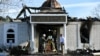 Security officials investigate the aftermath of a fire at the Victoria Islamic Center mosque in Victoria, Texas, Jan. 29, 2017. 