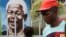 A child looks through a fence at a portrait of former president Nelson Mandela in a Park in Soweto, South Africa, March, 28, 2013.