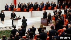Turkey's new President Tayyip Erdogan attends a swearing in ceremony at the parliament in Ankara, Aug. 28, 2014.