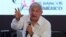 FILE - Leftist front-runner Andres Manuel Lopez Obrador, presidential candidate of the National Regeneration Movement (MORENA), addresses the audience during the Mexican Banking Association's annual convention in Acapulco, Mexico, March 9, 2018. 