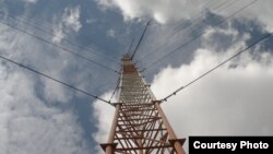 FILE - One of Lake Turkana Wind Power’s wind data masts measures wind at the site near Lake Turkana in Kenya. (Photo courtesy of LTWP) 