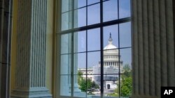 FILE - The Capitol is seen from the Cannon House Office Building rotunda, on Capitol Hill, in Washington, April 18, 2019.