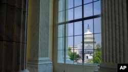 FILE - The Capitol is seen from the Cannon House Office Building rotunda, on Capitol Hill, in Washington, April 18, 2019.