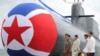 북한 첫 전술핵공격잠수함 공개…한국 “정상 운용 가능한 외형 아냐”