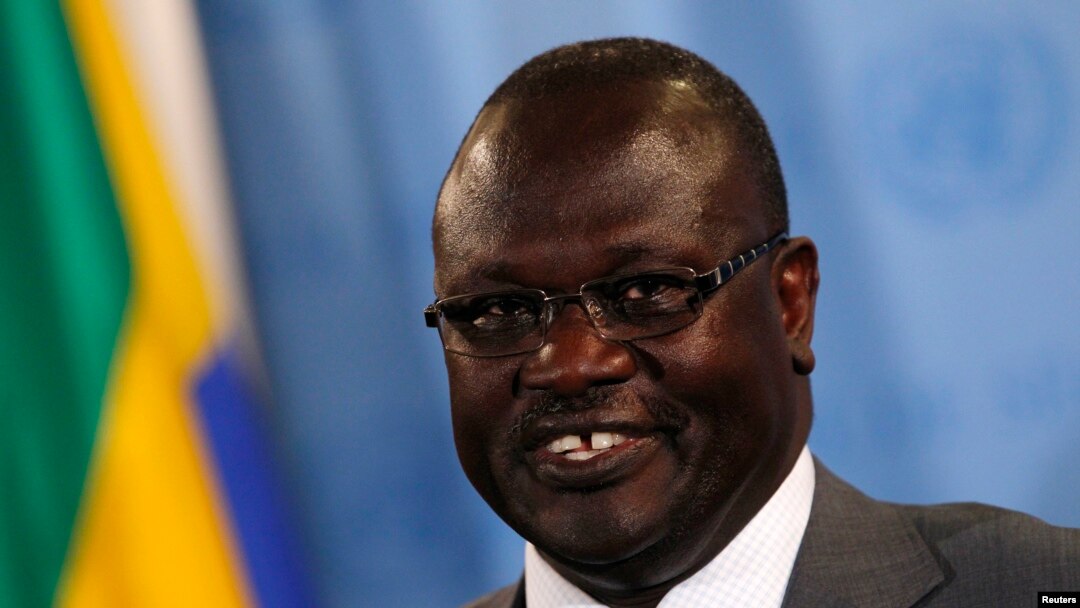 Backers of South Sudan's ex-Vice President Riek Machar, shown here speaking to reporters at the U.N. in July, say they are ready to meet with President Salva Kiir in Addis Ababa -- but insist that one condition be met. 