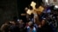 Christian worshippers hold crosses as they take part in a procession along Via Dolorosa on Good Friday during Holy Week in Jerusalem's Old City April 18, 2014. Christian worshippers on Friday retraced the route Jesus took along Via Dolorosa to his crucifi