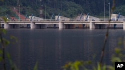 FILE - A dam is seen on the Nam Theun river in central Laos, Oct. 24, 2010.
