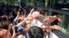 FILE — North Koreans on a bus say goodbye to their South Korean relatives after the Separated Family Reunion Meeting in North Korea, Aug. 26, 2018. The U.S. Congress did not pass a bill that would have reunited Korean Americans with their families in North Korea.