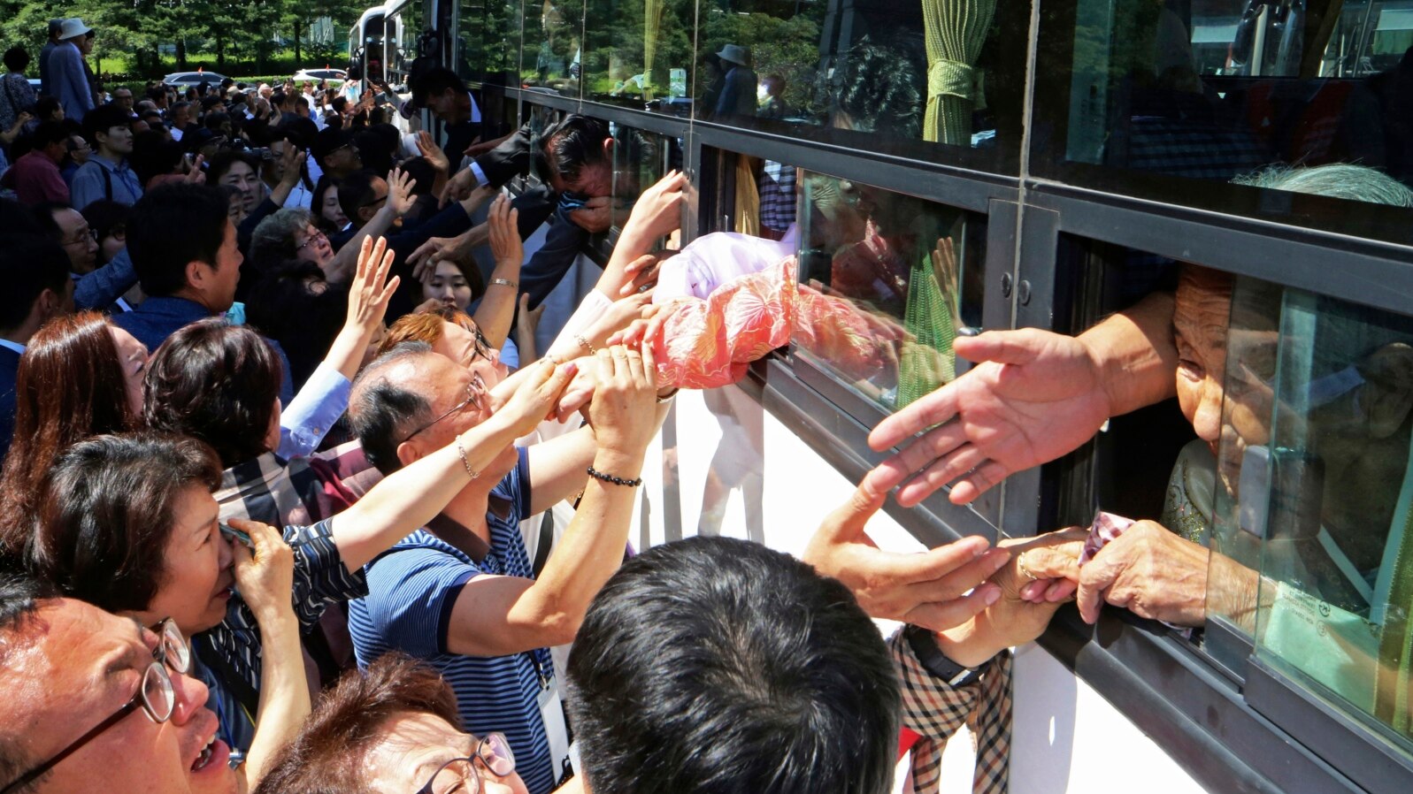 FILE — North Koreans on a bus say goodbye to their South Korean relatives after the Separated Family Reunion Meeting in North Korea, Aug. 26, 2018. The U.S. Congress did not pass a bill that would have reunited Korean Americans with their families in North Korea.
