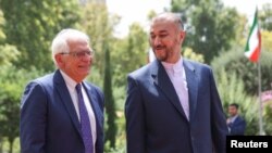 جوزپ بورل، مسئول سیاست خارجی اتحادیه اروپا، و حسین امیرعبداللهیان، وزیر امور خارجه ایران. (آرشیو)