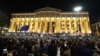 Georgian opposition supporters rally to protest results of the parliamentary elections that showed a win for the ruling Georgian Dream party, outside the parliament building in central Tbilisi, Oct. 28, 2024. 