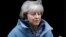 Arhiva - Britanska premijerka Tereza Mej napuša Dauning strit 10, u Londonu, 12. februara 2019.