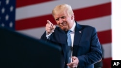 President Donald Trump arrives to speak to a crowd of supporters at Yuma International Airport, in Yuma, Arizona, Aug. 18, 2020 