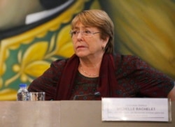 FILE - U.N. High Commissioner for Human Rights Michelle Bachelet listens during a meeting at the Foreign Ministry, in Caracas, Venezuela, June 20, 2019.