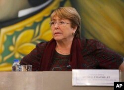 FILE - U.N. High Commissioner for Human Rights Michelle Bachelet listens during a meeting at the Foreign Ministry, in Caracas, Venezuela, June 20, 2019.