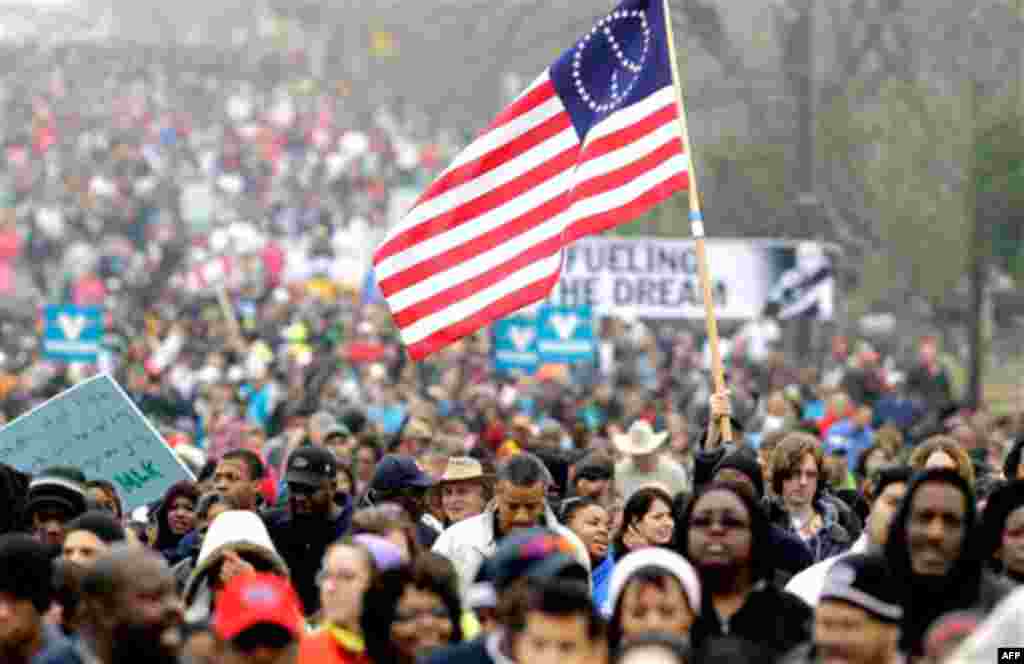 Thousands of people take part in the Martin Luther King Jr. Day march in San Antonio. (AP/Eric Gay)