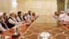 Mutlaq bin Majid al-Qahtani (R), special envoy of of the Qatari Foreign Minister for counterterrorism and mediation in conflict resolution, meets with members of Taliban's peace negotiation team in Doha, June 9, 2021.